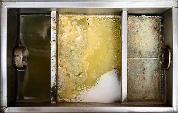 grease interceptors should be cleaned frequently, usually every 1-3 months, to prevent build-up and maintain efficient functionality